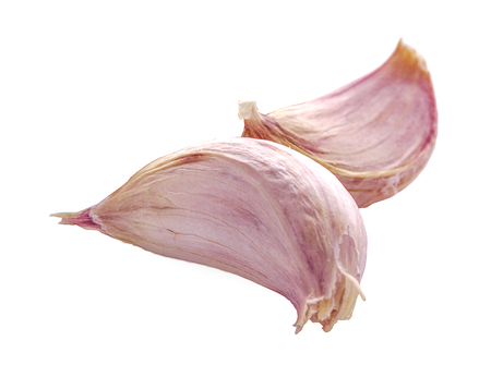 garlic isolated on white backgroundの写真素材