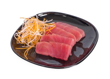 Slice of tuna isolated on white background の写真素材