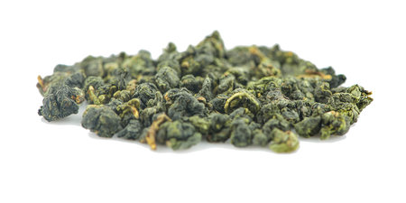 Dry oolong tea leaves an isolated on white background