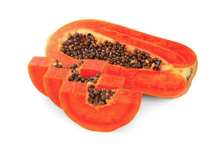 half of ripe papaya fruit with seeds isolated on white backgroundの写真素材