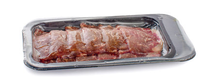 Vacuum-packed beef on a white background. Marbled beef from the store isolated on a white backgroundの写真素材