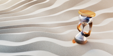  Hourglass on beach sandの写真素材