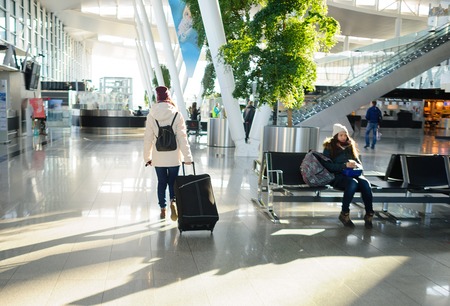 Passengers in the airport waiting room. Modern building. Comfort for the passengers.の写真素材