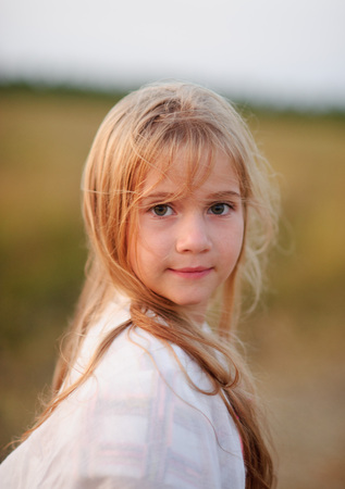 Portrait of the charming girl of 9-10 years.の写真素材