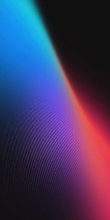 A vibrant abstract background featuring a smooth color gradient transitioning from bright blue to deep purple and finally to a warm red, creating a dynamic visual effect.の写真素材