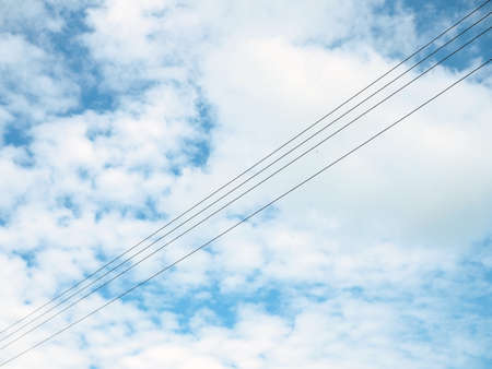 The high voltage cable on the background is an empty blue sky.
Minimal concept.の写真素材