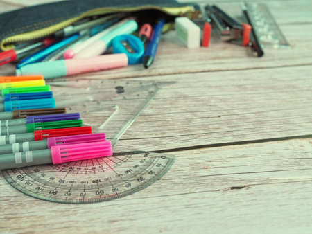 Stationary for office work Placed on a white wooden floor.の写真素材