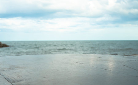 Empty stone floor On a blurred sea backgroundの写真素材