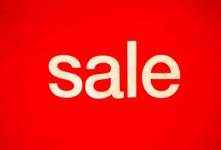 Photos of Red Discount Sign In a shopping mall. A red billboard printed the word sale on the...