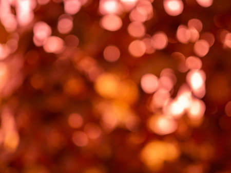 Abstract circle light bokeh background image There are bright yellow and orange light bulbs shining. Abstract background concept.の写真素材