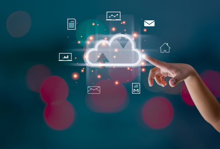 Finger pointing at the hologram cloud Represents search, communication, data storage with cloud...