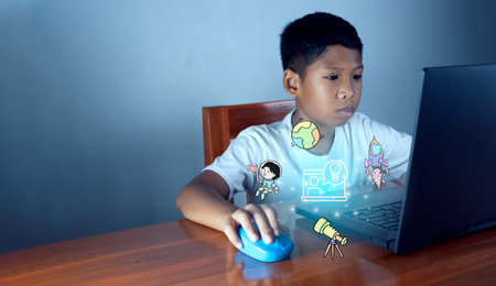 Education concept image. Creative idea and innovation. boy sitting staring at computer and there is...
