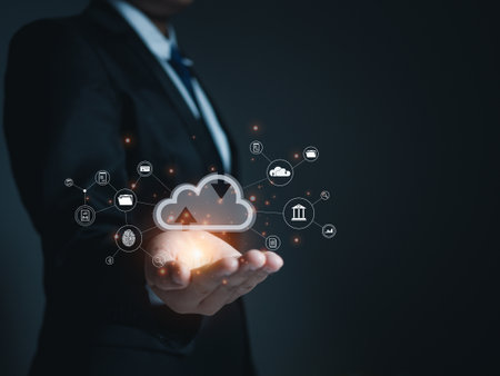 Businessman holding cloud icon. Cloud computing concept, connect communication equipment  information and technology with cloud computing.の写真素材