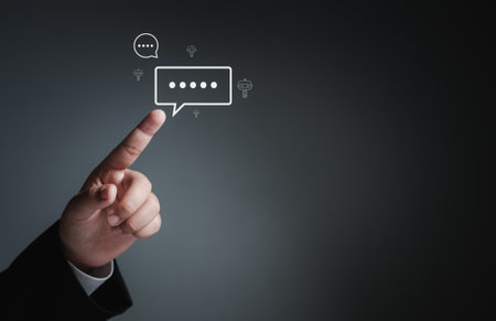 Businessman hand pointing at chat icon on digital web communication application and social network concept. social media application chat boxの写真素材