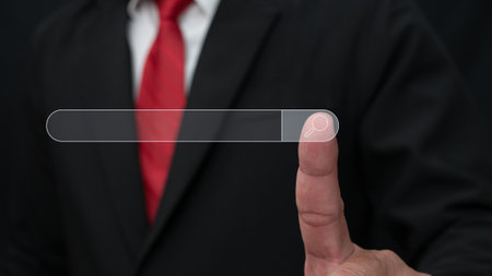 Businessman hand pointing at search engine icon. The concept of searching for information from the internet network.の写真素材