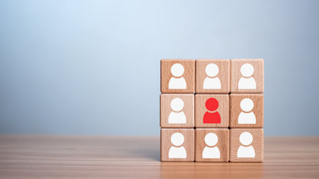 Concept Business and HR for leadership and team leader, one wooden dolls different and stand out from the group.の写真素材