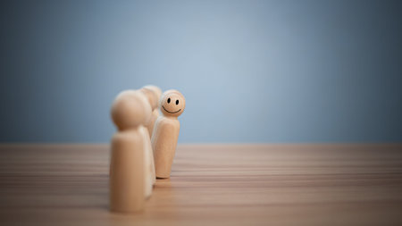 concept Business and HR for leadership and team leader, one wooden dolls stand out in front ...