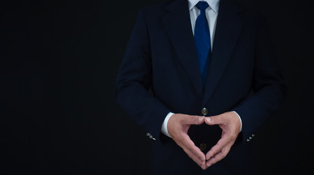 businessman standing on dark  background. business concept. suit.の写真素材