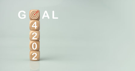 Wooden blocks lined up with the letters 2024. Represents the goal setting for 2024, the concept of a...