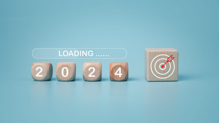 Wooden blocks lined up with the letters 2024. Represents the goal setting for 2024, the concept of a...