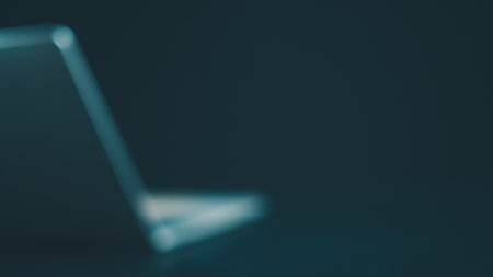 Abstract background, business and technology blurred computer background, side view of computer placed on dark background with copy space.の写真素材