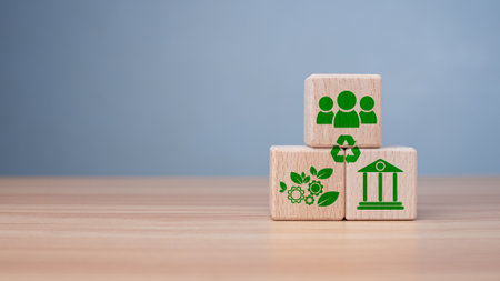 ESG concept of environmental, social and governance, wood block and icon on wooden background It is an idea for sustainable organizational development âaccount the green environment.の写真素材