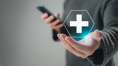 man hold in hand offer positive thing such as profit, benefits, development, CSR represented by plus sign, healthcare insurance.The hand shows the plus sign.の写真素材