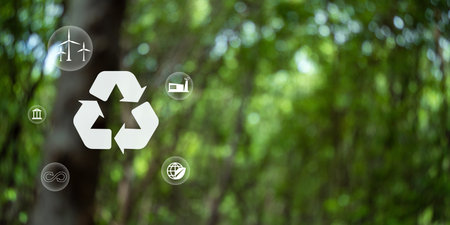 Recycle symbol on green bokeh background. Ecological and save the earth concept. An ecological...