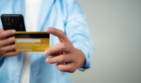 Online payment, Man using mobile smartphone and credit card for online shopping, Digital online...