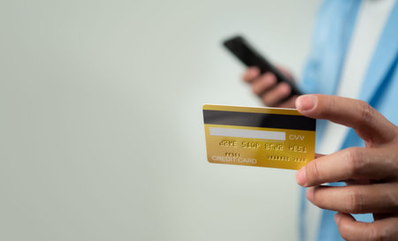 Online payment, Man using mobile smartphone and credit card for online shopping, Digital online...