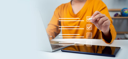 Business woman checking information from electronic online form, Checklist and filling survey form...