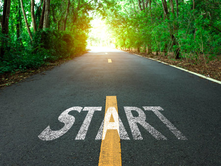 Starting line on asphalt road, Business startup idea, Copy space background, Path to success,...