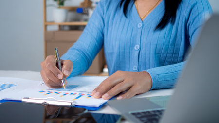 Businesswoman show paper documents to analyze business and manage corporate data, Business analytics...