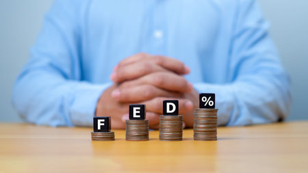 The Federal Reserve to control interest rates. FED concept. Wooden blocks FED. American economy and...