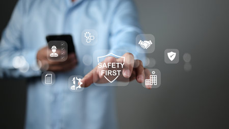 Safety first and work safety concept. Work safety concept, Concept safety first as a priority in professional environments, Safety first, Regulations and group insurance, Working standard process.の写真素材