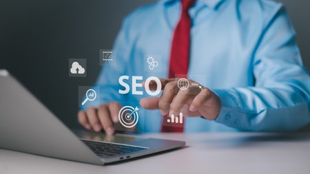 SEO search engine optimization concept. Businessman using a computer for analysis. SEO search engine optimization marketing Ranking traffic website internet business technology concept.の写真素材