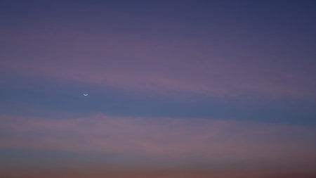 Sunset, Evening sky, Beautiful clouds at dusk, Moon and star, Nature background, Beautiful dark sky and bright white stars, Colorful clouds in summer, Peaceful and beautiful sunset.の写真素材