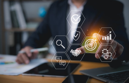 Goal Achievement The path to success, Target Plans and Business Strategies and Competitive Advantage, Businessman hand touching target icon Business Growth and Vision, Banking and Finance.の写真素材
