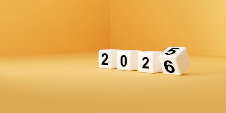 White cube flips from 2025 to 2026 on yellow floor, symbolizing fresh starts, planning, and strategy. Perfect for themes of new year goals, business vision, financial planning, andの写真素材