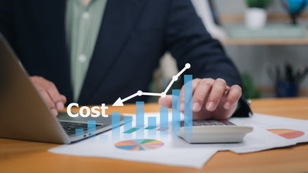 Businessman analyzing cost optimization and expense management with data analysis for budget planning and digital transformation, Modern finance, business strategies, operational efficiency.の写真素材
