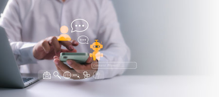 A business professional using a smartphone with chatbot AI and messaging interface icons,...