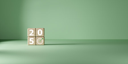 Wooden blocks spelling 2050 with target icon on green background, symbolizing carbon credit goals, net zero target, climate action, and long-term sustainability vision for a greener future.の写真素材
