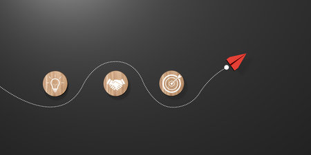 Red paper plane flying along dotted path with idea, partnership, and target icons on dark...