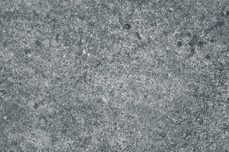 Dark gray concrete wall texture background with rough and natural surface, perfect for industrial, grunge, or modern design projects.の写真素材