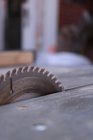 Chainsaw screw carpenter tools on a wooden table background,の写真素材