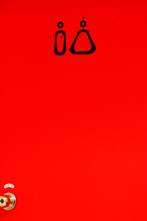 Bathroom door on sex between men and womenの写真素材