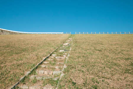 Stairs and blue sky on the lineの写真素材
