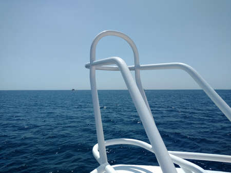 Beautiful view from the bow yacht towards the sea. Copy space. Snapshot of the front of the yacht in the summer.の写真素材