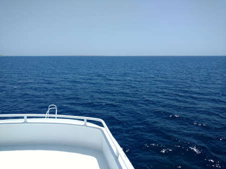 Beautiful view from the bow yacht towards the sea. Copy space. Snapshot of the front of the yacht in the summer.の写真素材
