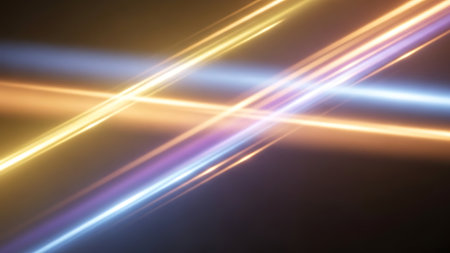 The showcases glowing light beams on a dark background. The beams are vibrant and dynamic, featuring a range of colors including yellow, orange, and blue. The abstract is use in Clear details and vibrant colors enhance visual appeal.の素材